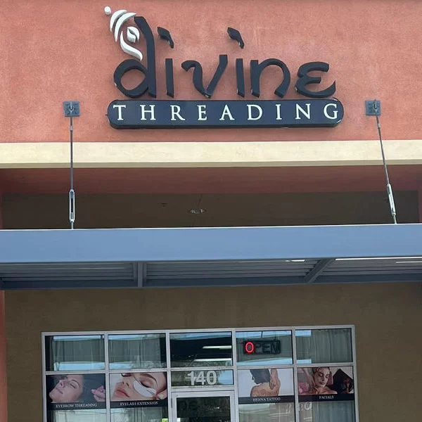 Divine Threading Centennial salon exterior featuring eyebrow threading, lashes, and facial services