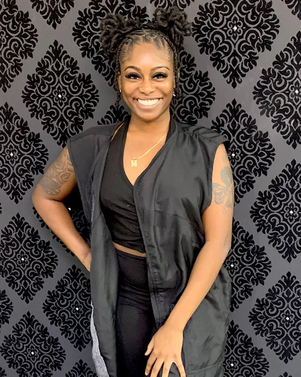 Expert beauty professional Mashea at Divine Threading and Lash Studio, specializing in premium brow and lash treatments.