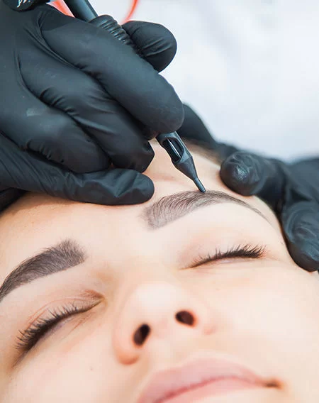 Professional microblading eyebrow procedure for natural, defined semi-permanent makeup results.